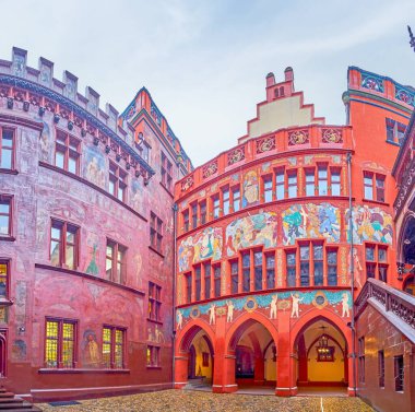 Panorama of Basel town hall courtyard with colorful frescoes, Switzerland