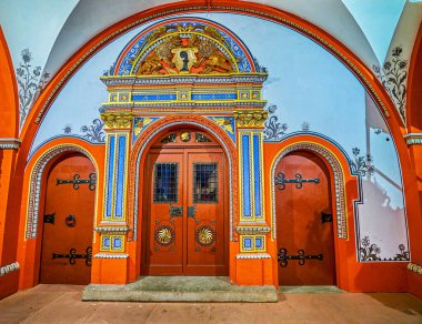 The colorful door frame in Town Hall with Coat of Arms of Basel, Switzerland