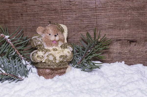 Souvenir a bear cub in snow — Stock Photo, Image