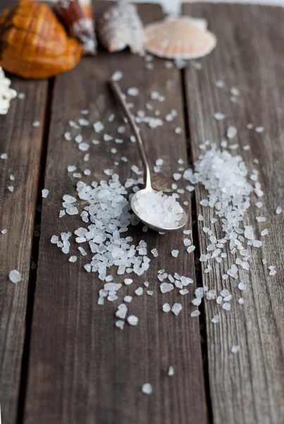 Sea salt crystals in a silver spoon — Stock Photo, Image