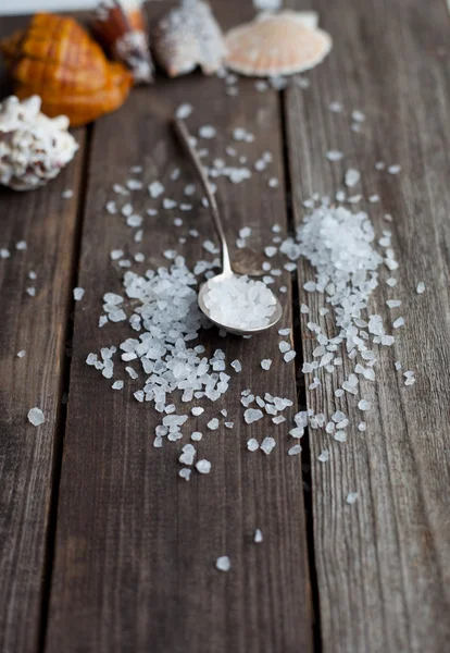 Sea salt crystals in a silver spoon — Stock Photo, Image