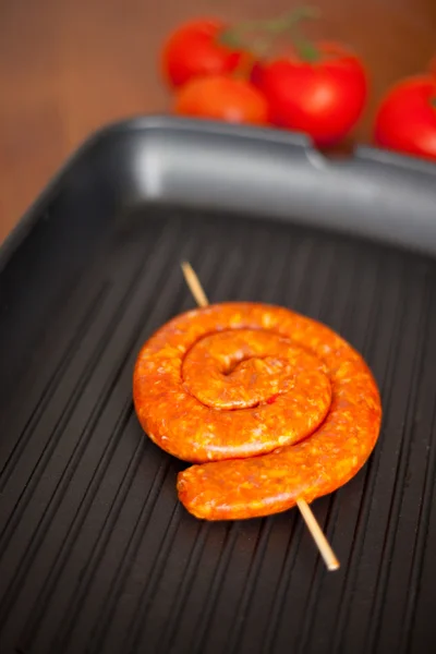 Chicken sausages on a grill pan — Stock Photo, Image