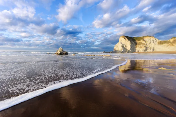 Sopelana beach with wave foam and reflections — Stock Photo, Image