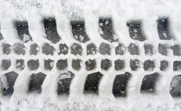 Wheel print in snow — Stock Photo, Image