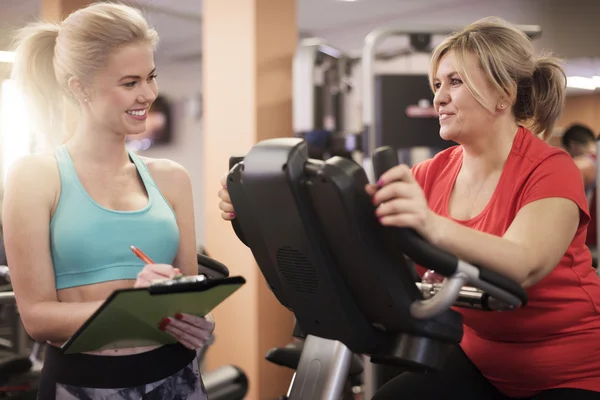 Woman working with professional trainer