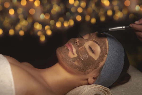 Woman lying during a spa treatment — Stock Photo, Image