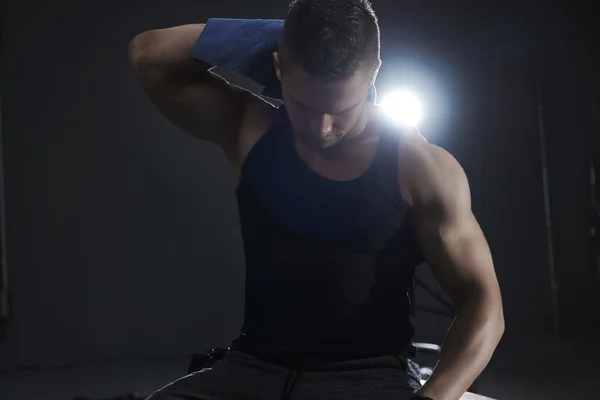 Handsome man resting after workout — Stock Photo, Image