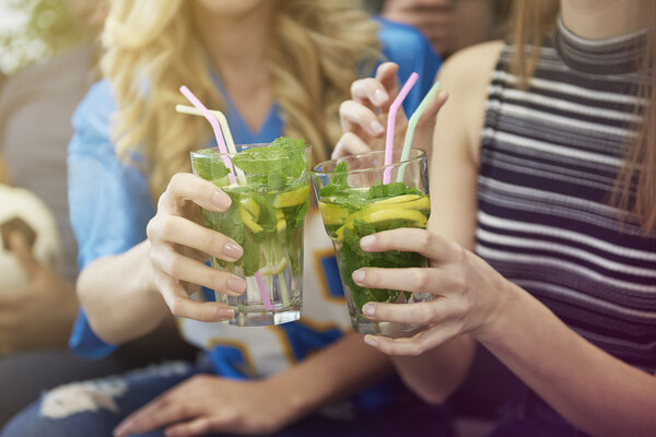 girls drinking cocktails  