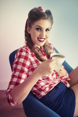 Pin up girl drinking coffee  clipart