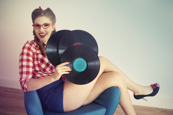 Pin up girl with vinyl records