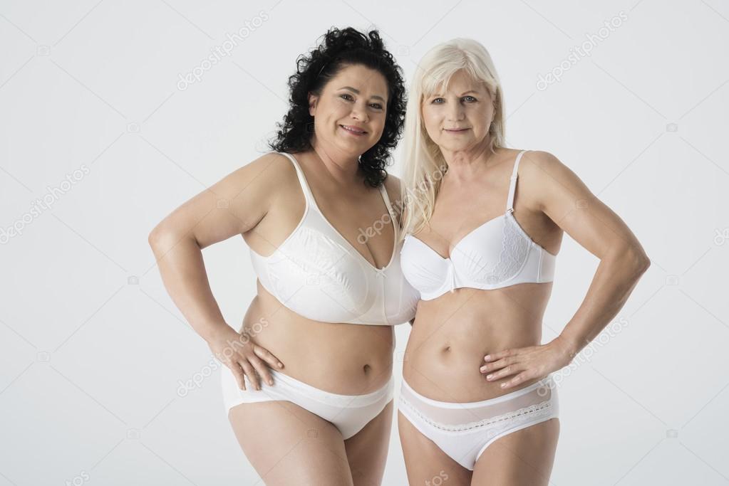Mature women posing in underwear Stock Photo by ©gpointstudio 112264224