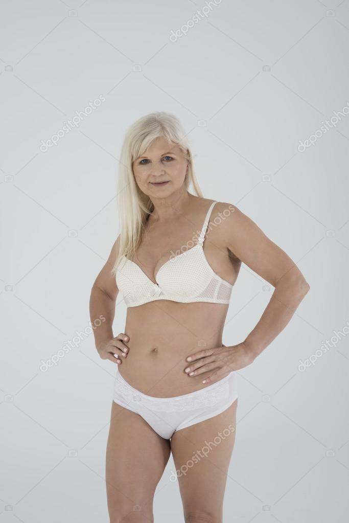 Senior woman in underwear Stock Photo by ©gpointstudio 112267352