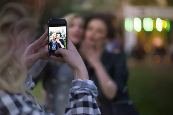 Women taking selfie from the festival — Stock Photo, Image