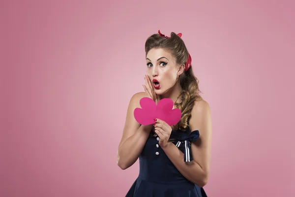 Pin up girl with pink paper hearts — Stock Photo, Image