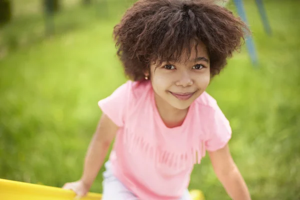 Cute african girl at the playground — Stock Photo, Image