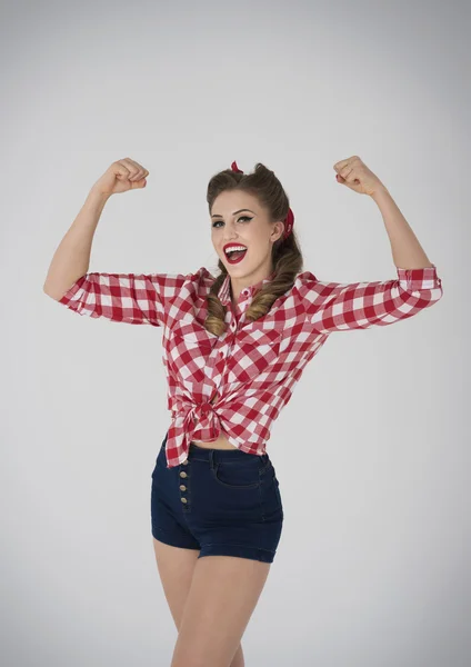 Pin up girl with raised hands — Stock Photo, Image