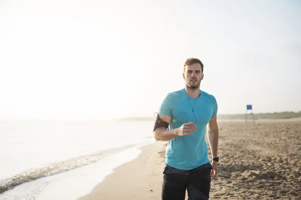 Man jogging in sunny day — Stock Photo, Image