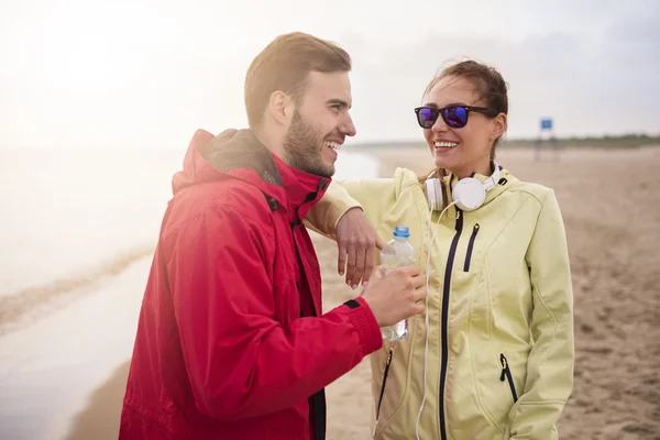 Couple during jogging on the beach — Stock Photo, Image