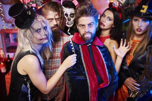 Spooky costumes of halloween party participants — Stock Photo, Image