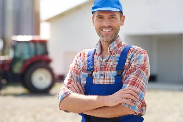 Farmer standing with crossed hands — Stock Photo, Image
