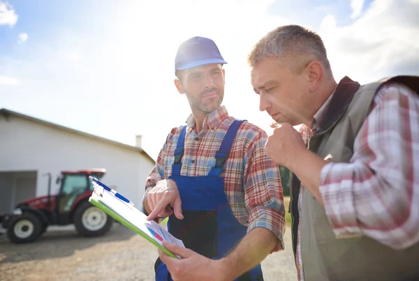 Business partners discussing agricultural plan — Stock Photo, Image