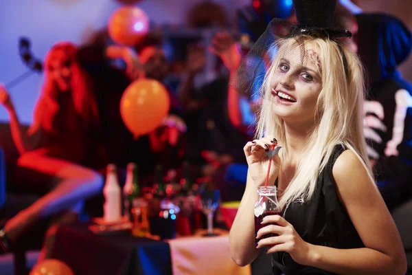 Girl with a bloody drink — Stock Photo, Image