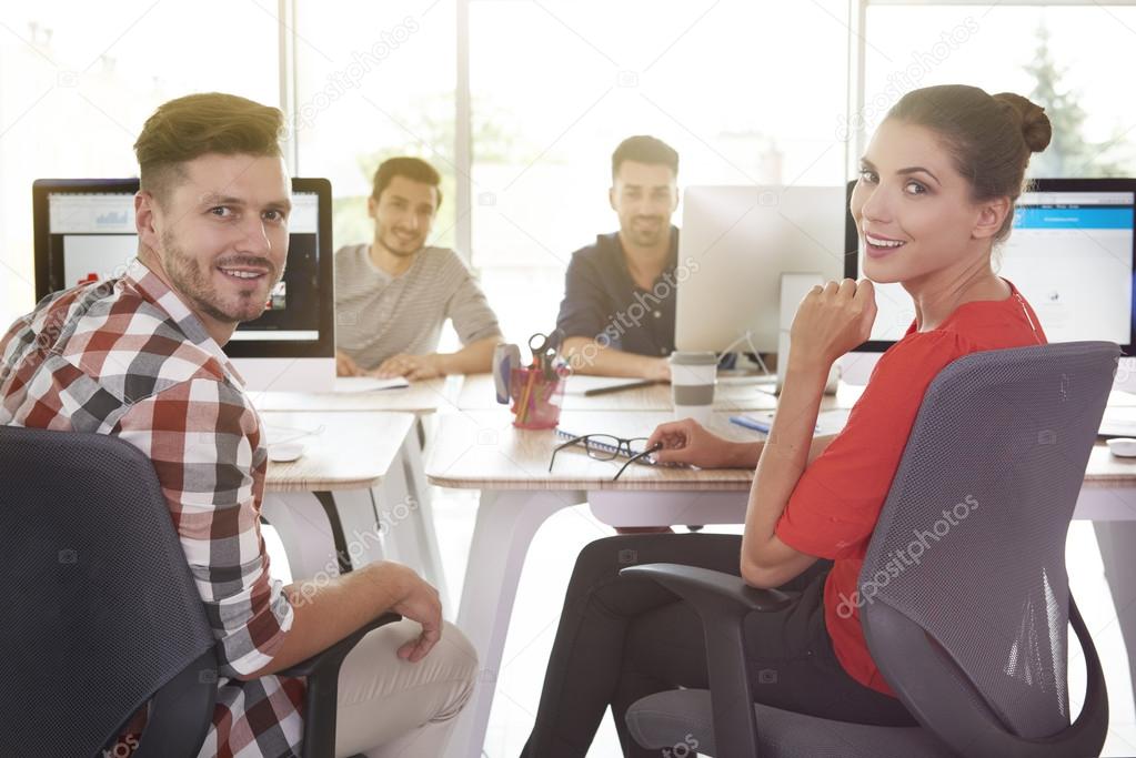 Group of young white collar workers Stock Photo by ©gpointstudio 122611106