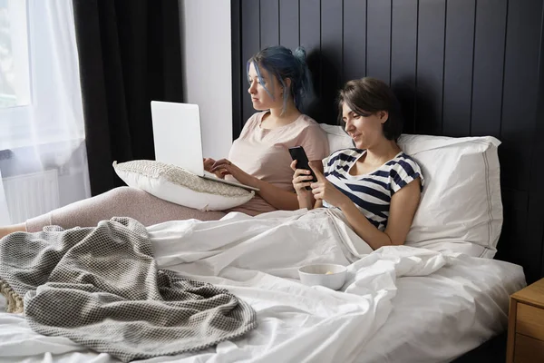 Lesbian Couple Spending Morning Bed Laptop Phone — Stock Photo, Image