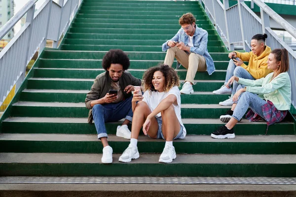 Group Young People Sitting Stairs Mobile Phones — Stock Photo, Image