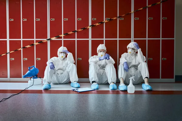 Overworked Healthcare Worker Resting Floor — Stock Photo, Image