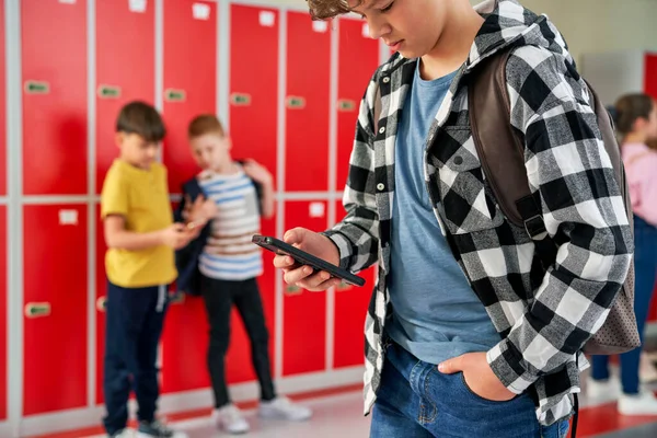 Schoolboy Reading Text Message Mobile Phone — Stock Photo, Image