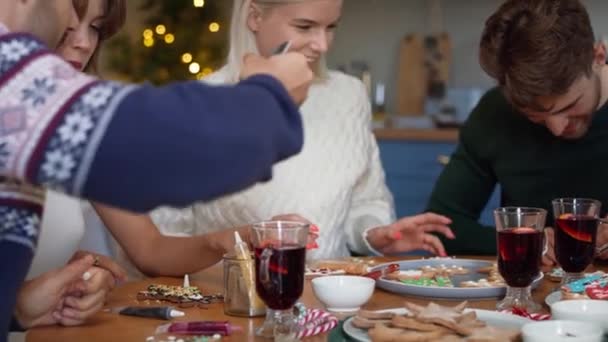 Gingerbread Cookies Decorated Adult Friends Shot Red Helium Camera — Stock Video