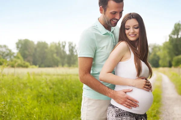 Pregnant woman with husband — Stock Photo, Image