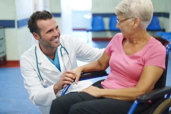 Doctor takes care about patient — Stock Photo, Image