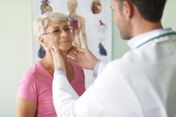 Doctor takes care about patient — Stock Photo, Image