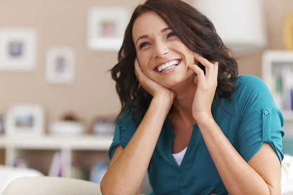 Laughing woman in interior Stock Photo