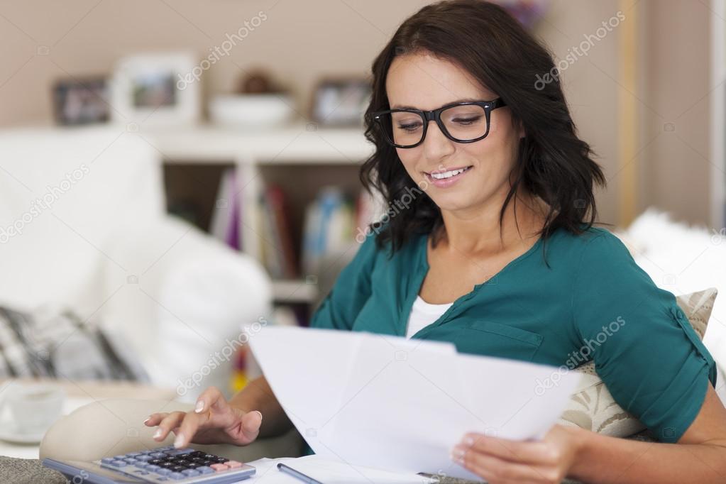 Woman paying bills