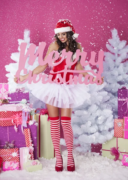 Girl holding  Merry Christmas for everyone sign — Stock Photo, Image
