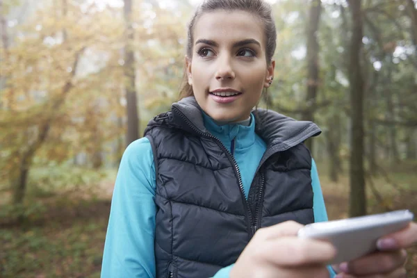 Woman on running with digital tablet — Stock Photo, Image