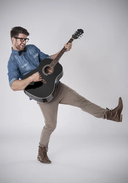 Fashion musician with guitar — Stock Photo, Image