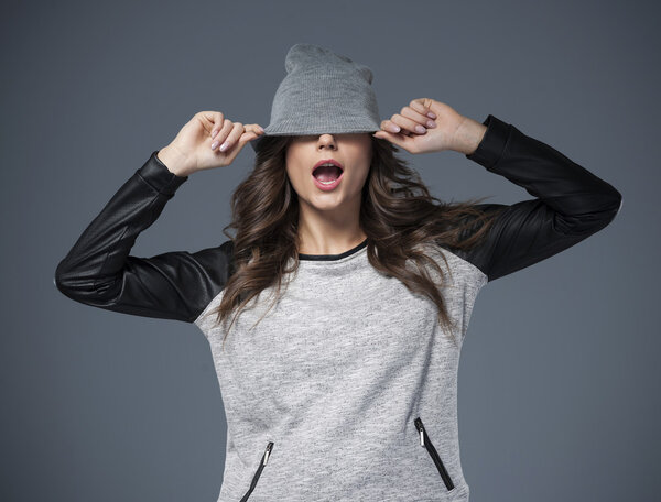 Stylish young woman in hat