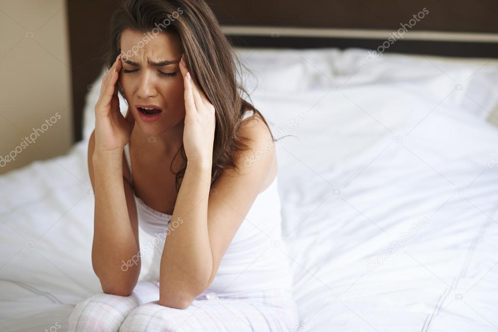 Young woman with headache