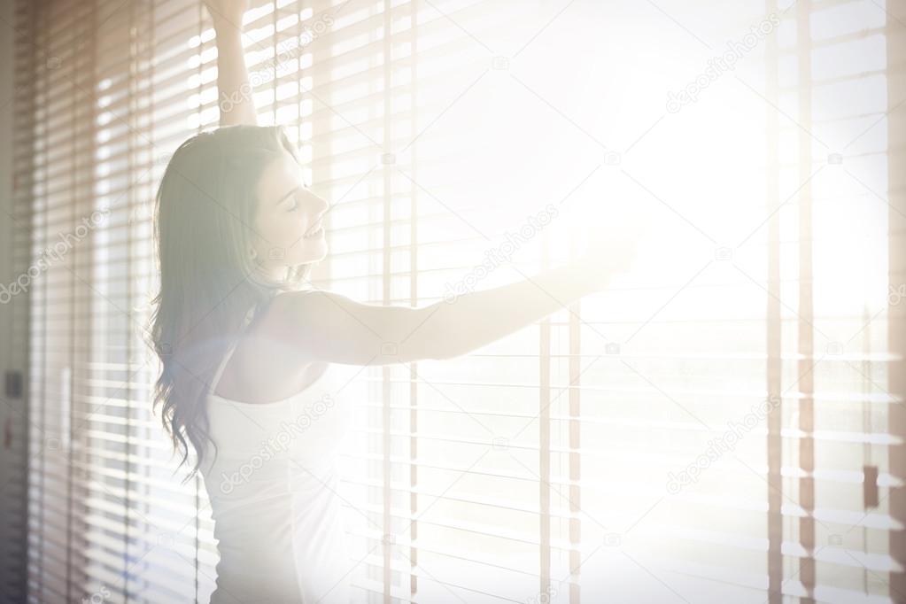 Woman in sunny room