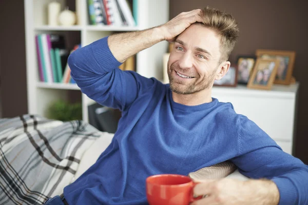 Young man at home with coffee — Stock Photo, Image