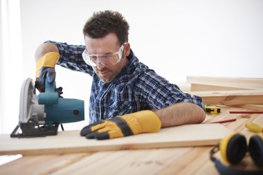 Young handsome carpenter clipart