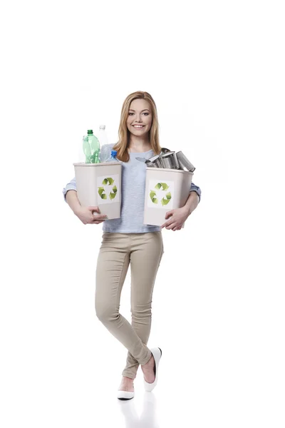 Young woman in plastic recycle concept — Stock Photo, Image