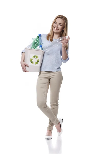 Young woman in plastic recycle concept — Stock Photo, Image