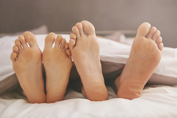 Couple in comfortable bed — Stock Photo, Image