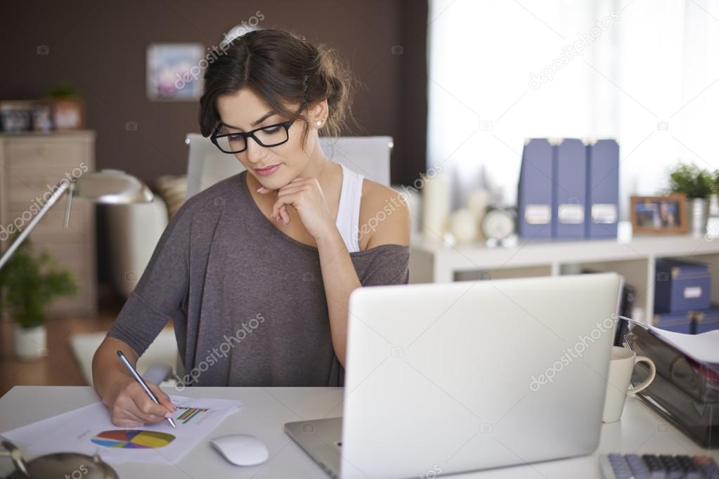 Young woman working at home