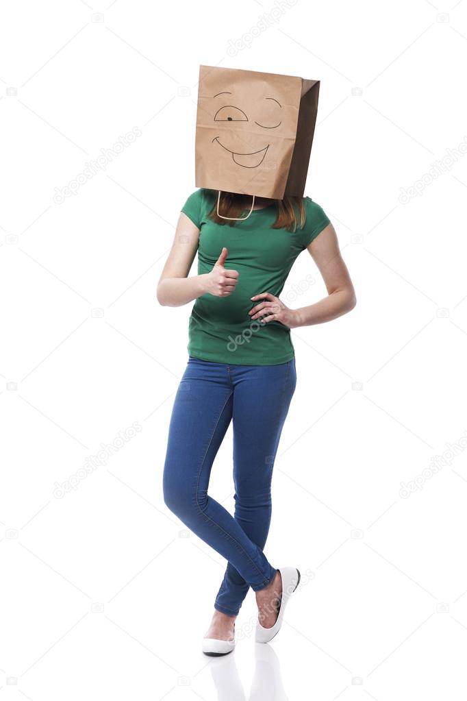Female ecologist with paper bag on head